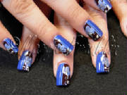 nail art in blue and brown